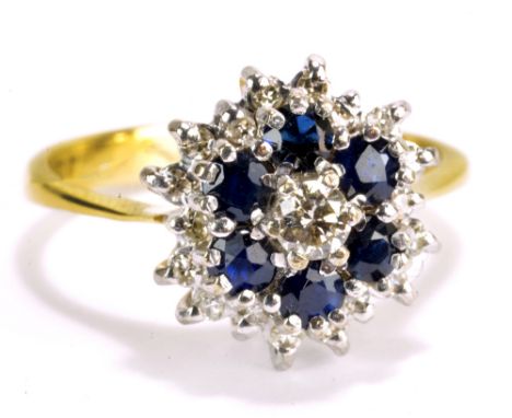 An 18ct yellow gold, diamond and blue stone cluster ring in stepped arrangement, size O, approx 5.5g.