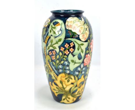 MOORCROFT; a tubeline decorated 'Golden Lily' pattern baluster vase, impressed mark to base, height 31cm. CONDITION REPORT: U