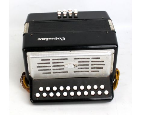 A Delicia accordion with case.