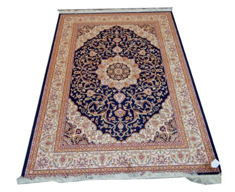 A blue ground Keshan carpet, 230 x 160cm.