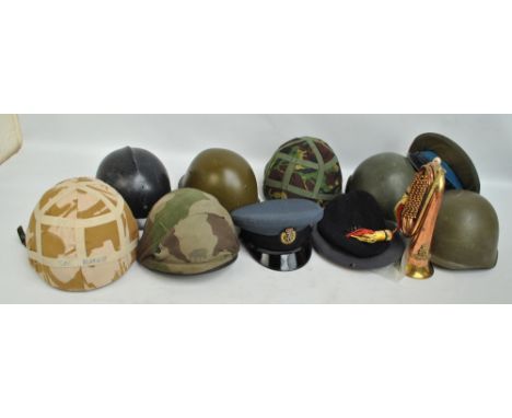 A group of helmets including NATO Desert Combat GS MKVI and green painted examples, Compton & Webb Ltd RAF dress cap and two 