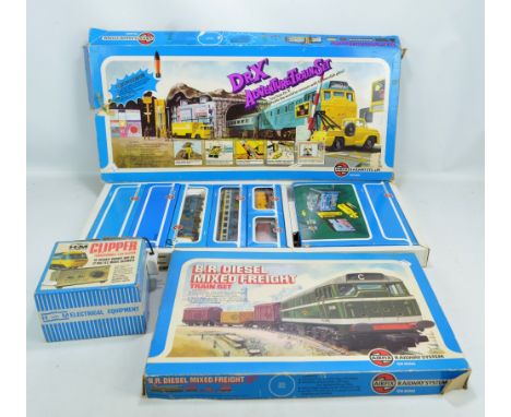 A boxed Airfix 00 scale Dr. 'X' adventure train set, a B.R. diesel mixed freight train set and a boxed H&M Clipper transforme