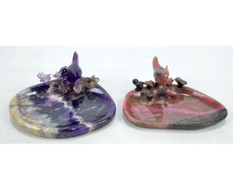 An amethyst oval pin dish decorated with hen and five chicks (one missing), width 12cm, and a smaller quartz dish (af) (2). C