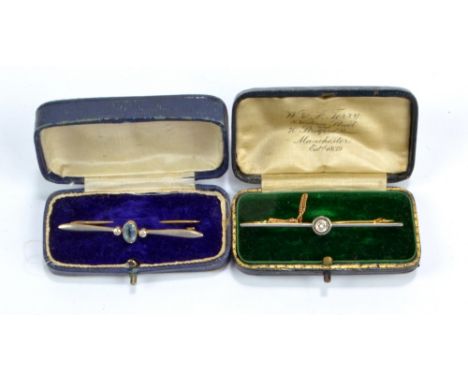 An unmarked yellow and white metal bar brooch set with Old European Cut diamond, length 6cm, and a 15ct yellow and white gold