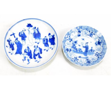 A Chinese porcelain circular shallow bowl painted in underglaze blue with Eight Immortals to the top and with three lucky bat