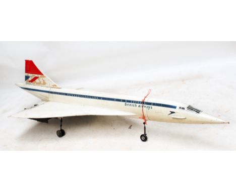 A large wooden model British Airways Concorde G-BBDG, length approx 210cm (af). CONDITION REPORT: The model is purportedly fr