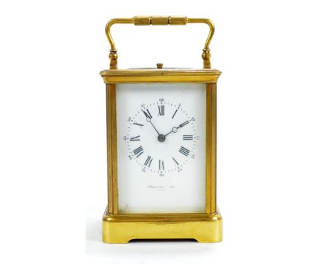 J BAGSHAW & SONS; a brass repeating carriage clock, the white enamel dial set with Roman, Arabic and baton numerals, on brack