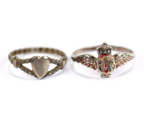 CHARLES HORNER; an Edward VII hallmarked silver ring with heart shaped platform and star motif decorated band, size M, Cheste