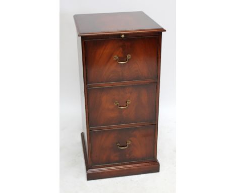 A reproduction mahogany three drawer filing cabinet, approx 107 x 54cm. CONDITION REPORT: Light surface scratches and scuffs 