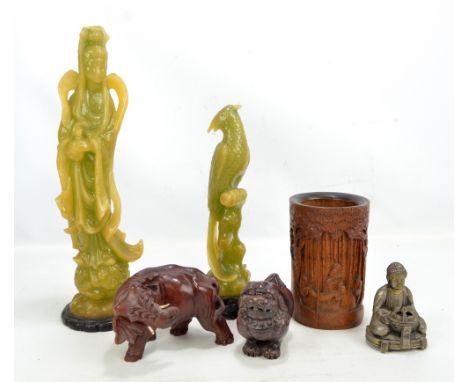 A group of various Chinese items including a bamboo brush pot, a hardwood carving of an elephant and two resin jade coloured 