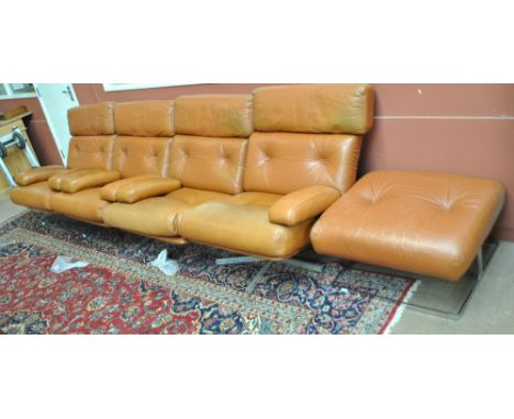 TETRAD; a late 1960s tan leather four piece suite comprising settee, swivel chair, fixed chair and ottoman stool, with adjust