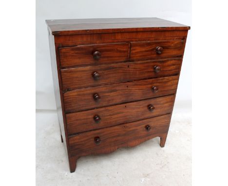 An early 19th century mahogany chest of two short and four long graduated drawers raised on splay bracket feet, width 107cm.