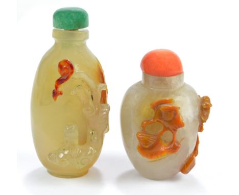 A Chinese pale grey hardstone snuff bottle of ovoid form, carved in Soochow style in brown skin with a figure and a crane, he