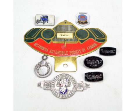 A small collection of lapel badges including enamel on brass historical Automobile Society of Canada car badge, width 13.3cm,