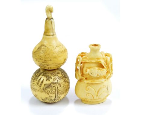 A 19th century Chinese turned ivory snuff bottle modelled as a double gourd vase, ink work decorated with architectural and m