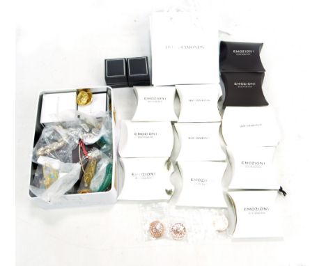 A quantity of costume jewellery including pendants, ear clips, titanium rings, bracelets, etc.