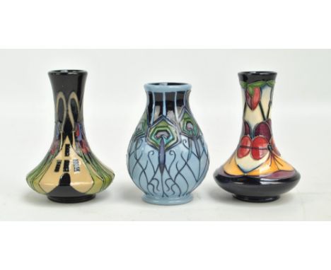 MOORCROFT; a tubeline decorated 'Peacock Parade' pattern baluster vase by Nicola Slaney, impressed marks to base, dated 2013,