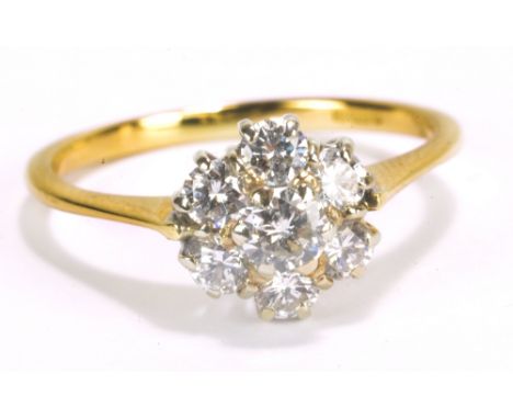 An 18ct yellow gold and diamond cluster ring, size J 1/2, approx 2.5g.