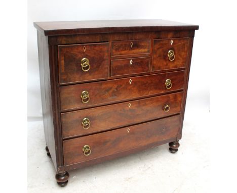 An early Victorian mahogany 'Scotch' chest with moulded top above two short central drawers flanked by twin deep drawers and 