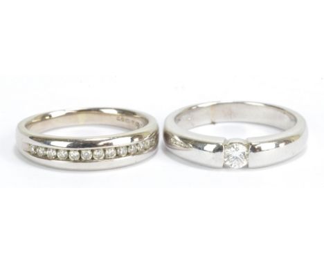 A white metal and diamond solitaire ring stamped '18k' to inner band, size J 1/2, and an 18ct white gold and diamond half ete