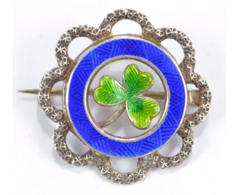 CHARLES HORNER; an Edward VII hallmarked silver green and blue guilloche enamel detailed lobed circular brooch, centred with 