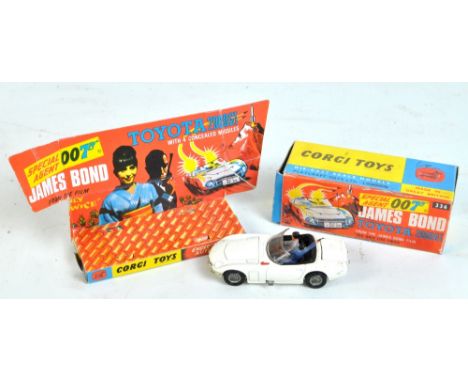 A boxed Corgi 336 'Special Agent 007 James Bond Toyota 2000GT' in white with black interior, both figures present, Secret Ins
