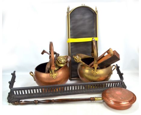 A group of metalware including cast iron fender, fire screen, two coal scuttles, H&B side lamp and brass cased S. Smith & Son
