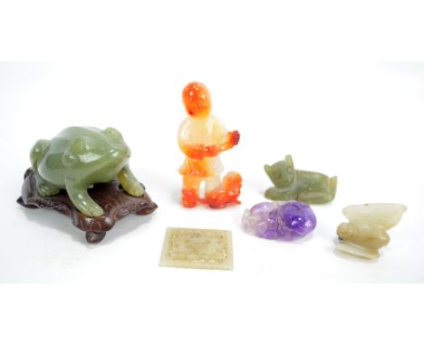 Three Chinese carved hardstone figures including a green hardstone frog on stand, length 8cm, also an amethyst peach shaped p