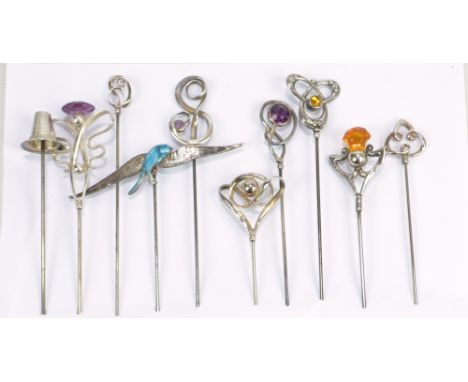 CHARLES HORNER; ten variously hallmarked silver hat pins including a hinged blue guilloche enamel detailed bird shaped exampl