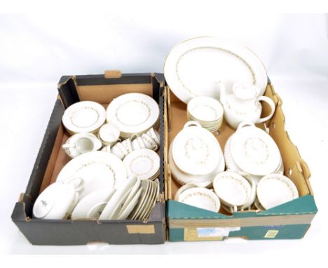 A Royal Doulton 'Fairfax' pattern decorated nine setting dinner and tea service, comprising dinner plates, side plates, salad