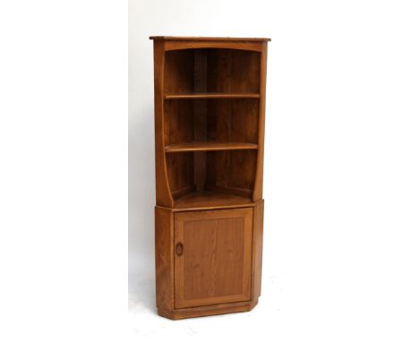 ERCOL; an elm freestanding corner cupboard with open upper section and cupboard beneath.