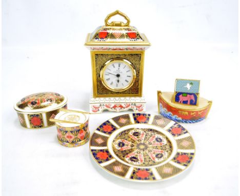 Five pieces of Royal Crown Derby including 'Old Imari' pattern mantel clock, a paperweight modelled as Noah's Ark and a drum 