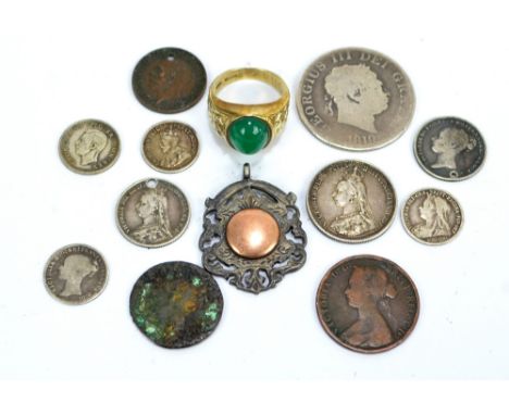 A small group of pre-1947 silver British coinage, including George III half crown, a Victoria young head sixpence and a Georg