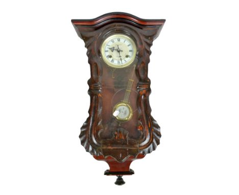 An Orient stained beech thirty-one day wall clock, length approx 70cm. CONDITION REPORT: Wear and tear throughout with loss t