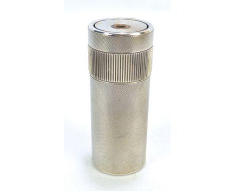 A boxed Dupont cylindrical table lighter with engine turned finish, stamped and numbered E3023 base, height 11cm.