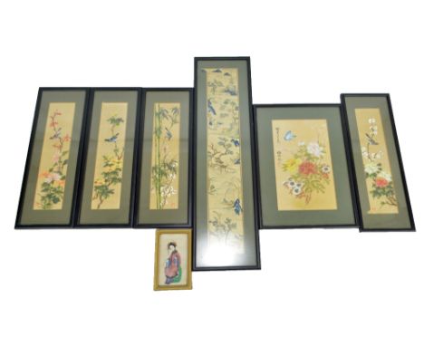 A set of four Chinese painted silks depicting birds perched on branches, three with seal mark, 29.5 x 7cm, a further example 