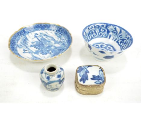 A 19th century Chinese porcelain circular bowl painted in underglaze blue with scrolls and floral motifs, with six character 