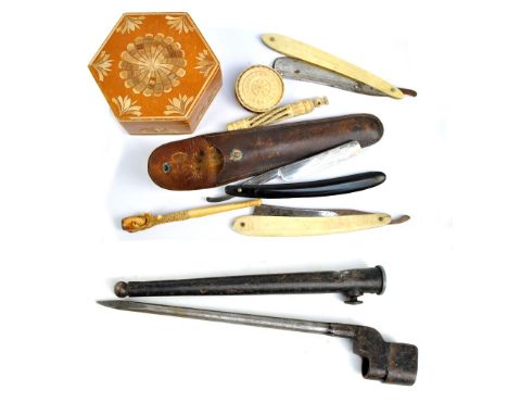 A group of collectors' items including a cased George Butler & Co of Sheffield horn handled cut throat razor, two further cut