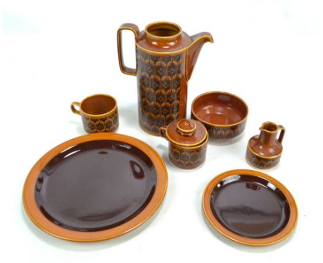 A Hornsea Heirloom part coffee set. CONDITION REPORT: Black marks, one cup chipped, general surface wear, one saucer body chi