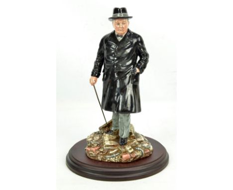 A Royal Doulton HN3433 limited edition 'Winston S. Churchill' figure, no. 777/5000, on oval wooden plinth, height of figure a