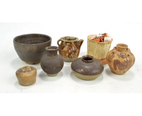 An early Chinese provincial ceramic part glazed bowl, diameter 8cm, two early vessels with lug handles, a miniature vase inci