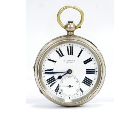 H STONE; a George V hallmarked silver key wind open face pocket watch, the white enamel dial set with Roman numerals and subs