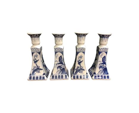 Set of 4 Blue and White Delft Type Candlesticks with chinoiserie decorationHeight 23.5 cmsSmall hole to lower body of one fac