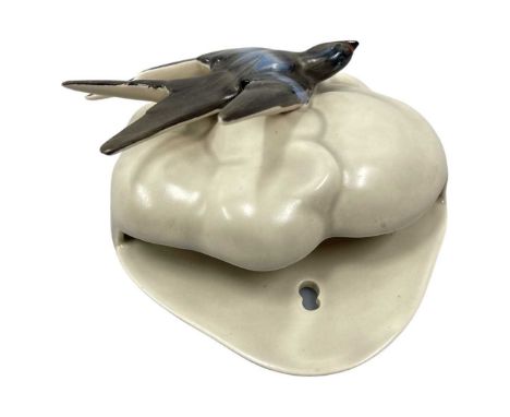 Clarice Cliff - Swallow - A wall pocket circa 1936, relief moulded with a Swallow in flight in enamel colours over a cloud po