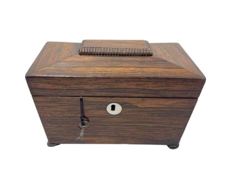 Early 19th Century Rosewood Tea Caddy. Sarcophagus shape, with two lidded receptacles for the tea. Mother of pearl escutcheon