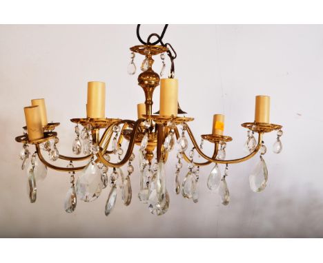 A set of three 20th Century chandelier electrolier ceiling light fixtures. Each with faceted glass droplets to the multiple a