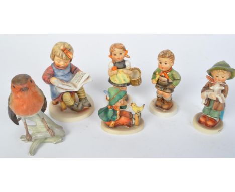 A assortment of vintage late 20th century Goebel West Germany children porcelain figurines. All marked to the underside with 