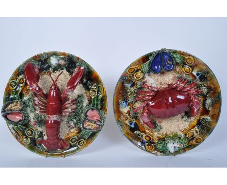 Two vintage 20th century ceramic Portuguese Palissy style charger plates. Each having detailed crab and lobster to centre mod