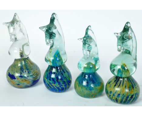 Mdina - A collection of vintage 20th Century studio art glass horse paperweights. With horse form to top into a rounded marbl