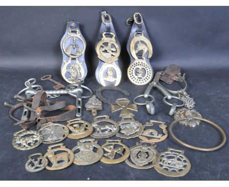 A collection of vintage retro 20th century horse brasses to include several novelty pieces alongside a collection of horse st